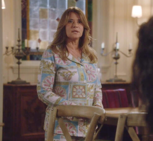 5 Lorraine Bracco as Angela Rizzoli in colourful patterned pyjamas on the Rizzoli and Isles set.