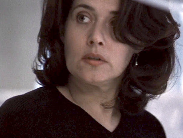 9 Close-up of Lorraine Bracco looking anxious in a scene from The Taking of Pelham 1 2 3.