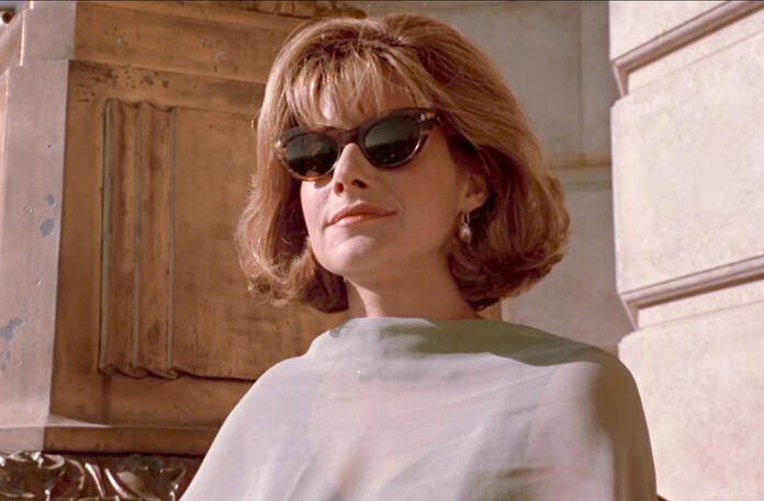 11 Lorraine Bracco as Bobbie looking proud while wearing sunglasses in Talent for the Game.