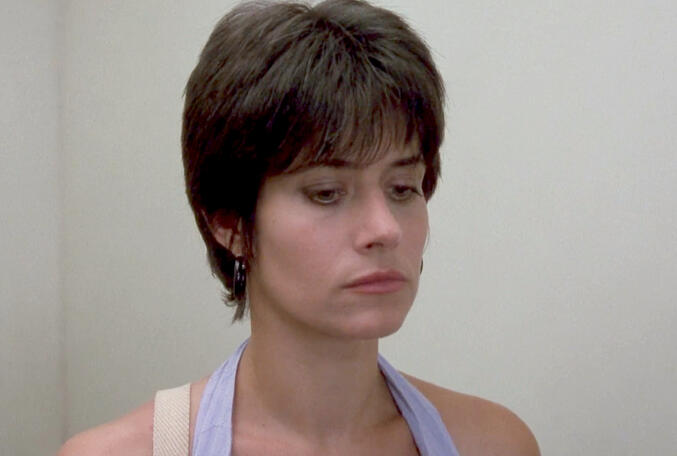 7 Lorraine Bracco close-up with a concerned expression in The Dream Team.