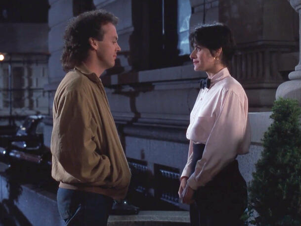 10 Lorraine Bracco and Michael Keaton talking outside at night, The Dream Team.