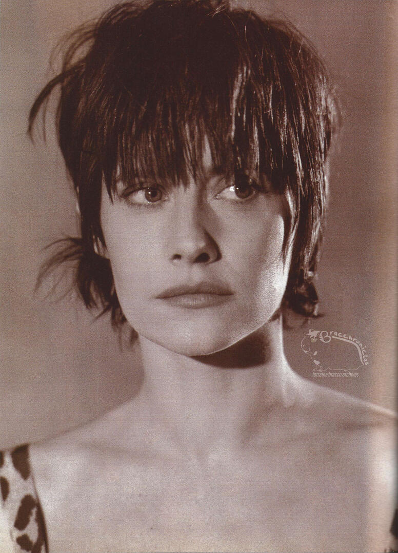 Mademoiselle magazine fashion feature featuring a close-up sepia portrait of actress Lorraine Bracco with a short, choppy haircut and a leopard print top.